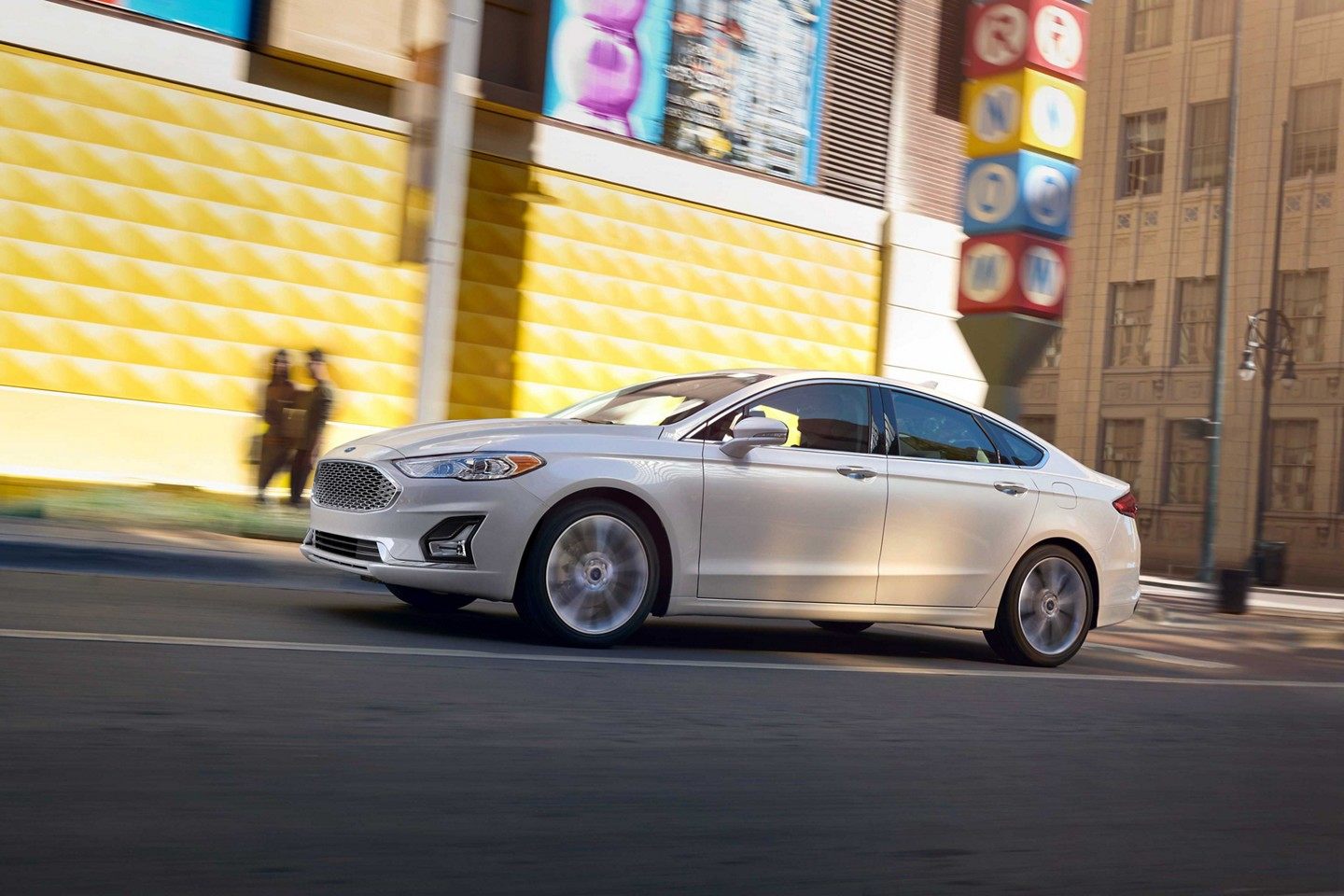 2019 Ford Fusion Driving White Exterior